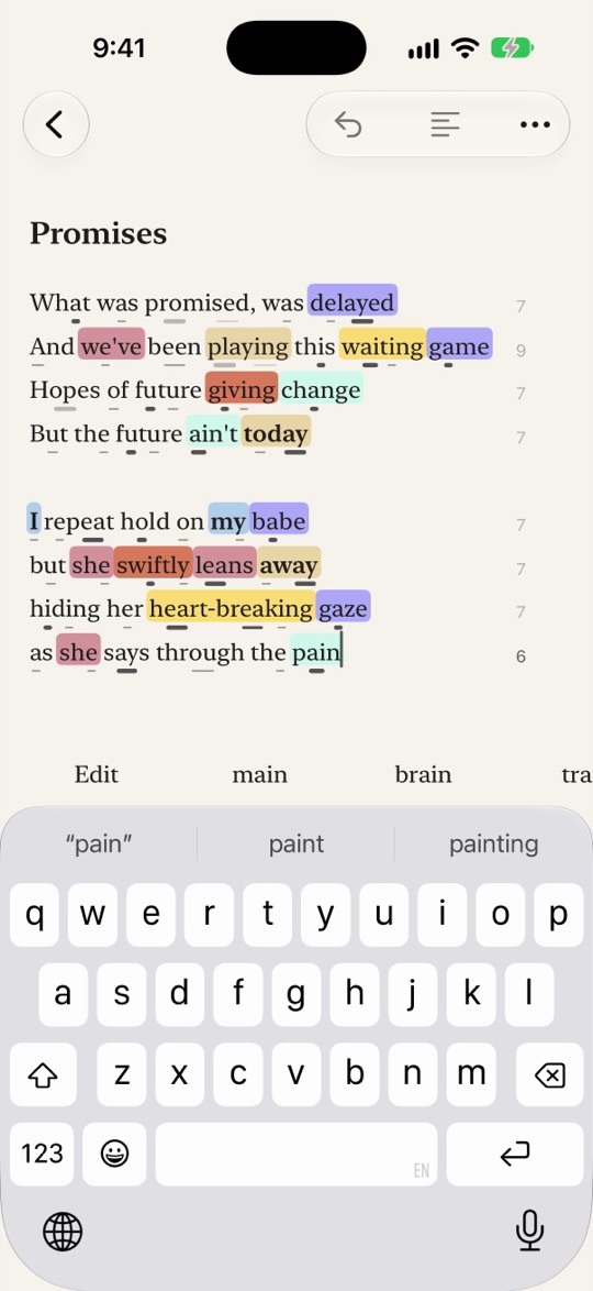 The row above the keyboard offering rhymes for the word being typed.